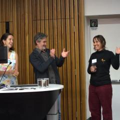 Image of three people at TalkFest event