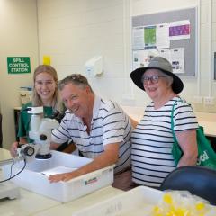John and Meta Goodman with President of the UQ Marine Society, Larissa Young